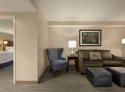 Lounge area in suite with comfortable seating