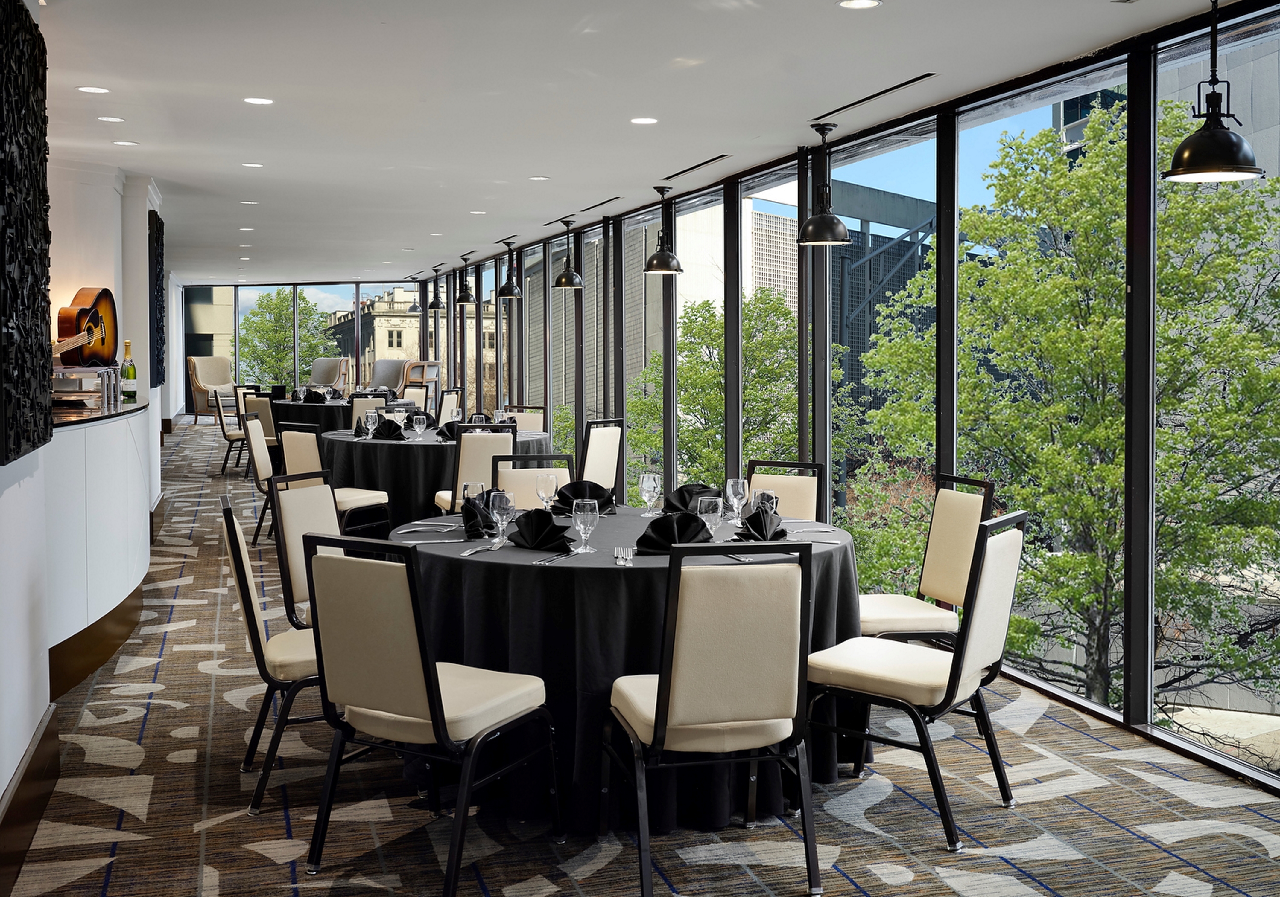 event space with round tables and chairs