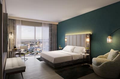 Zimmer mit Kingsize-Bett und Clubsessel