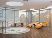 Indoor Hot Tub with Lounge Chairs