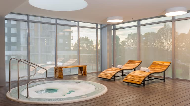 Indoor Hot Tub with Lounge Chairs