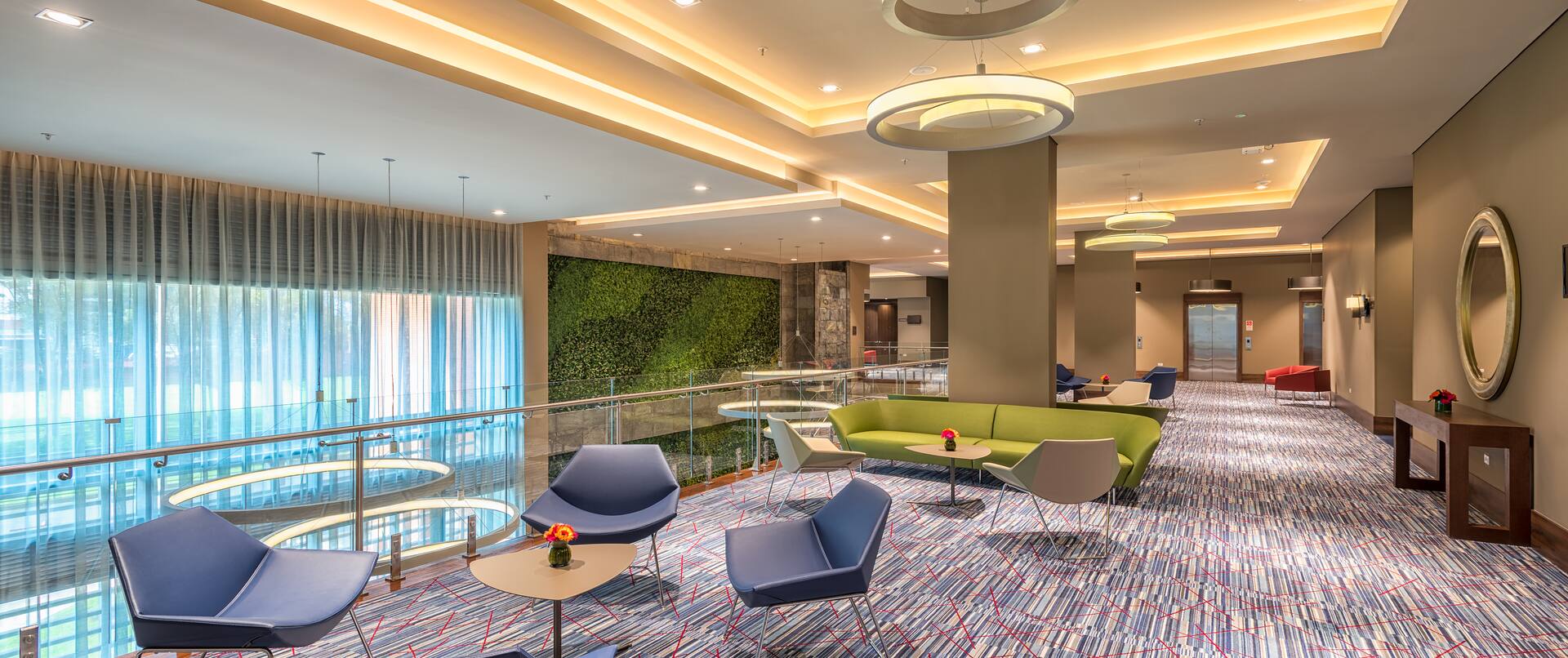 Lobby Seating Area with Chairs. Tables and Sofa