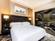 Large Bed in Suite with Terrace