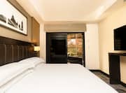 Large Bed in Suite with HDTV