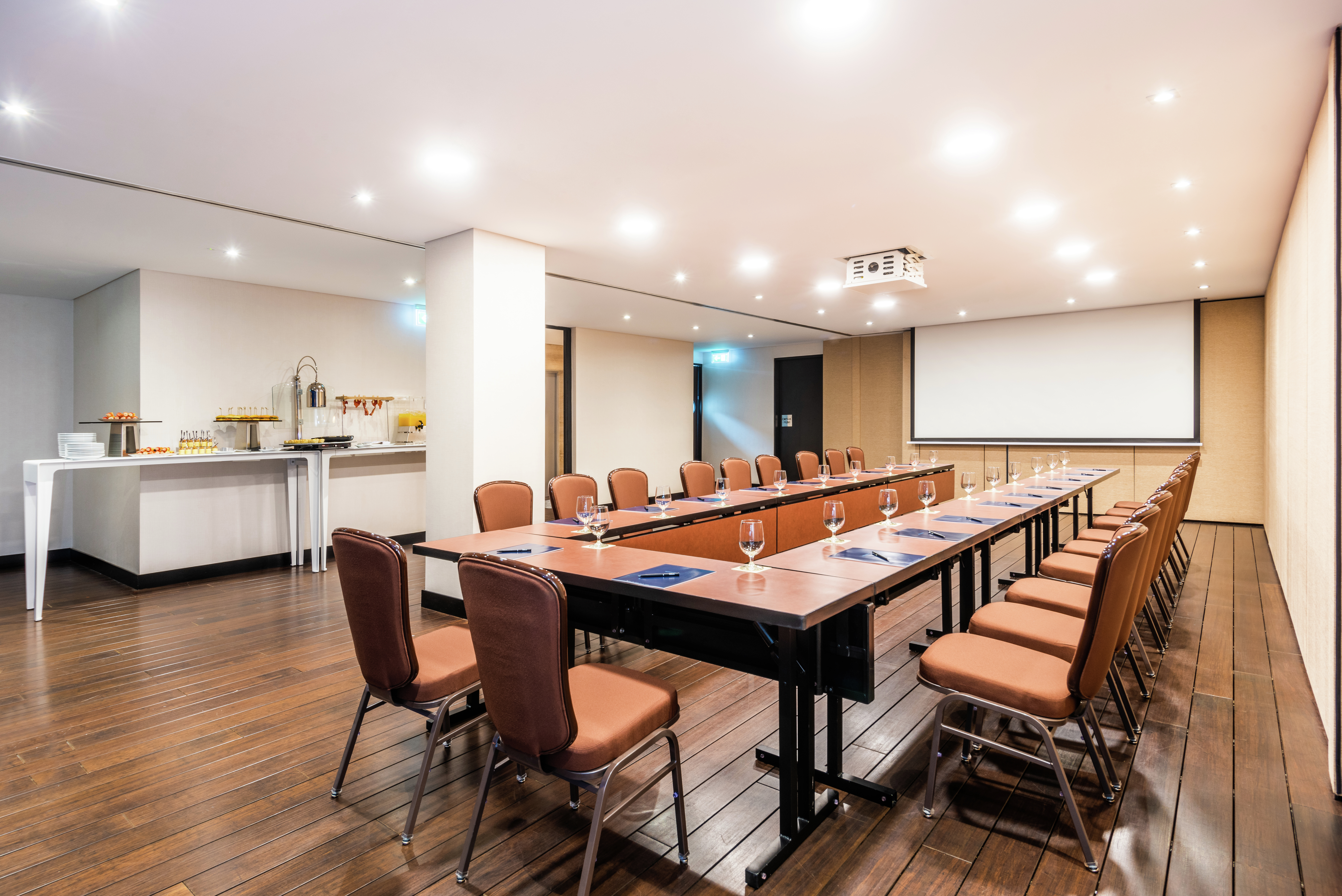 U Set Up Meeting Room with Seating for 20 Guests