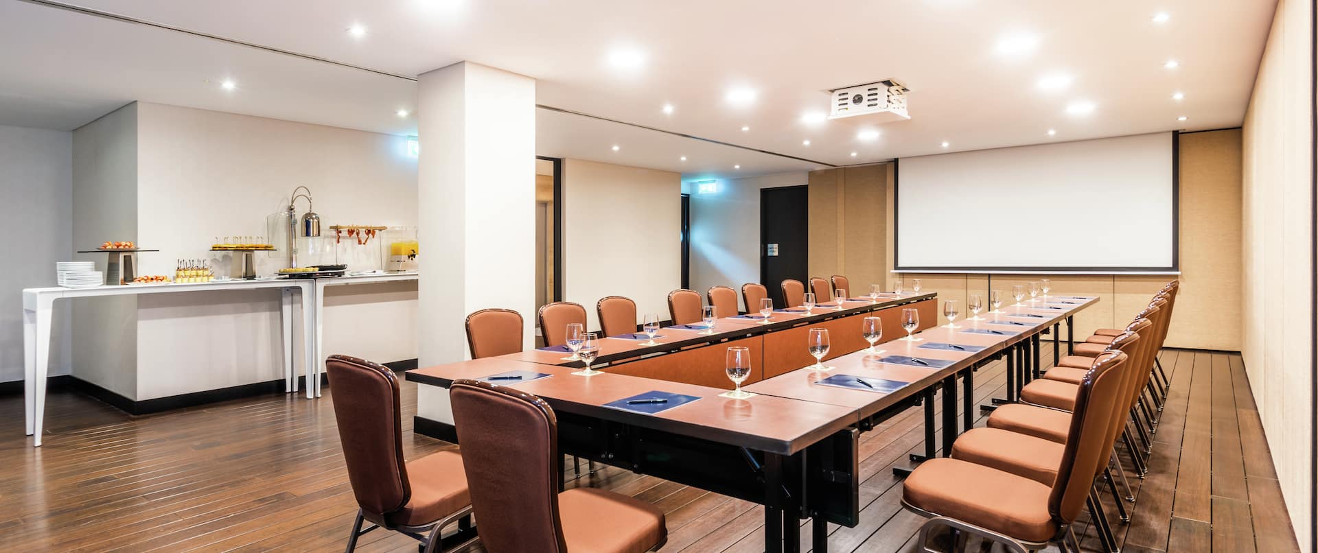 U Set Up Meeting Room with Seating for 20 Guests