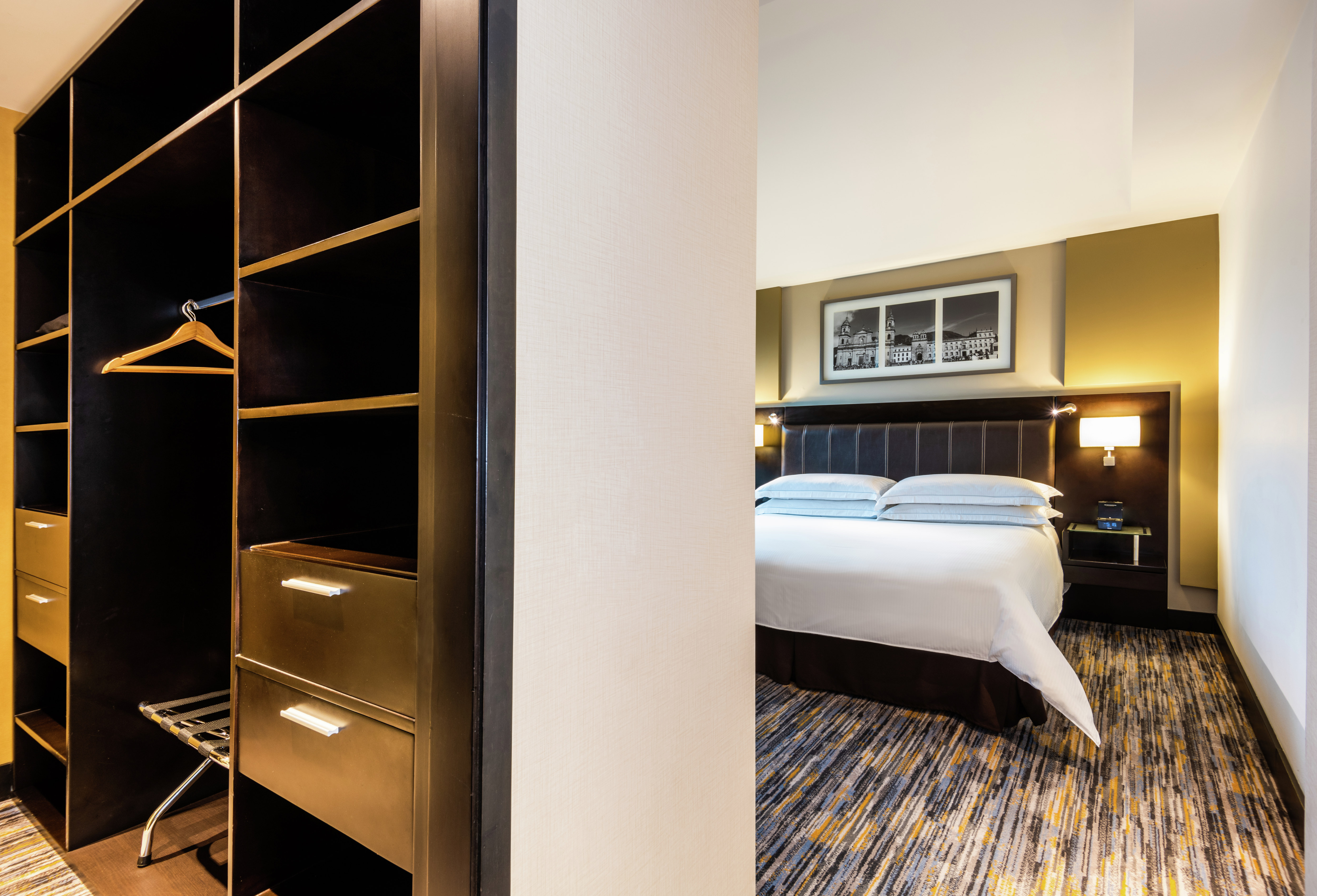 View of King Suite Bed and Closet Area