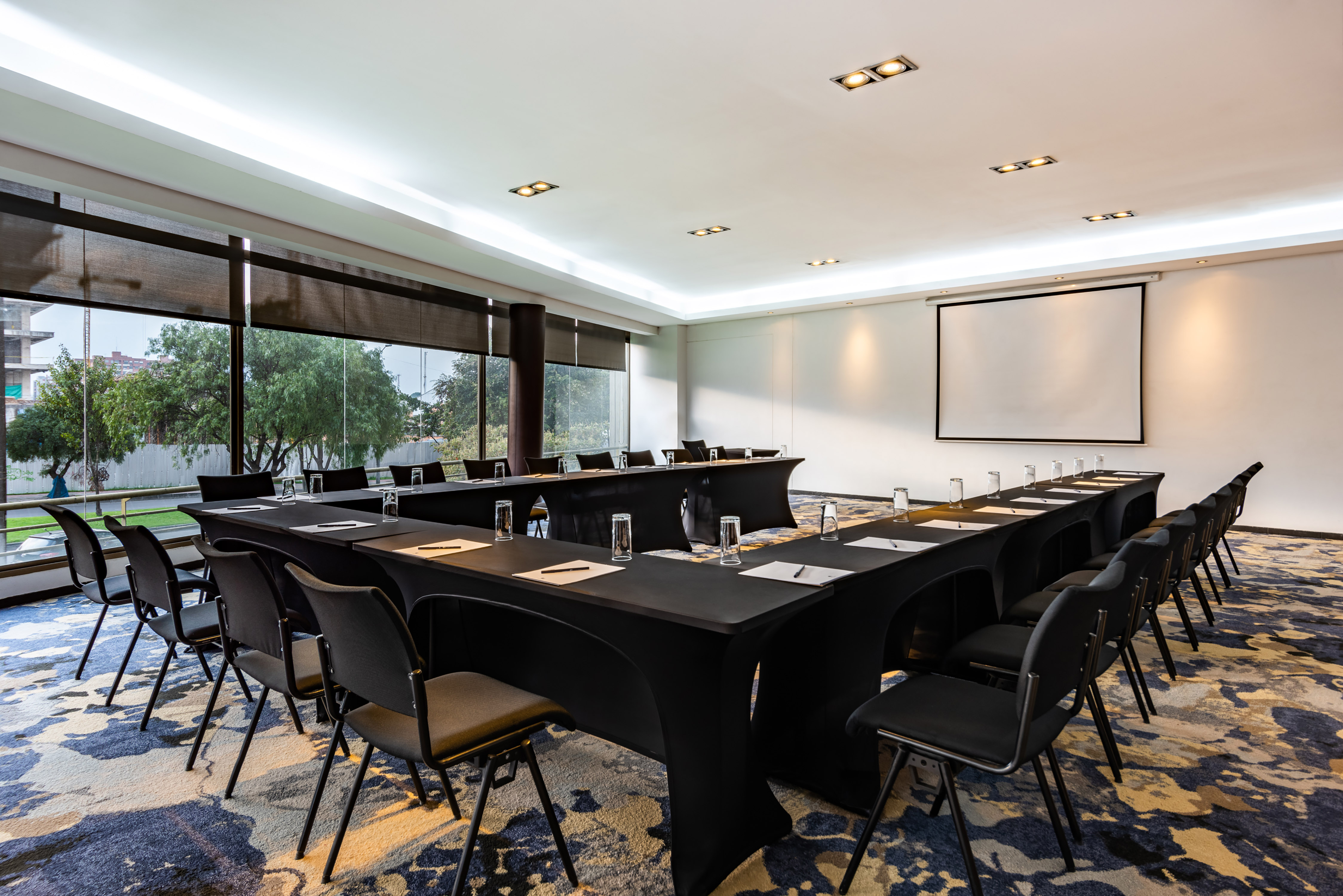 Meeting Room U Style Setup with Projection Screen