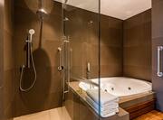 Bathtub and Separate Shower in Suite