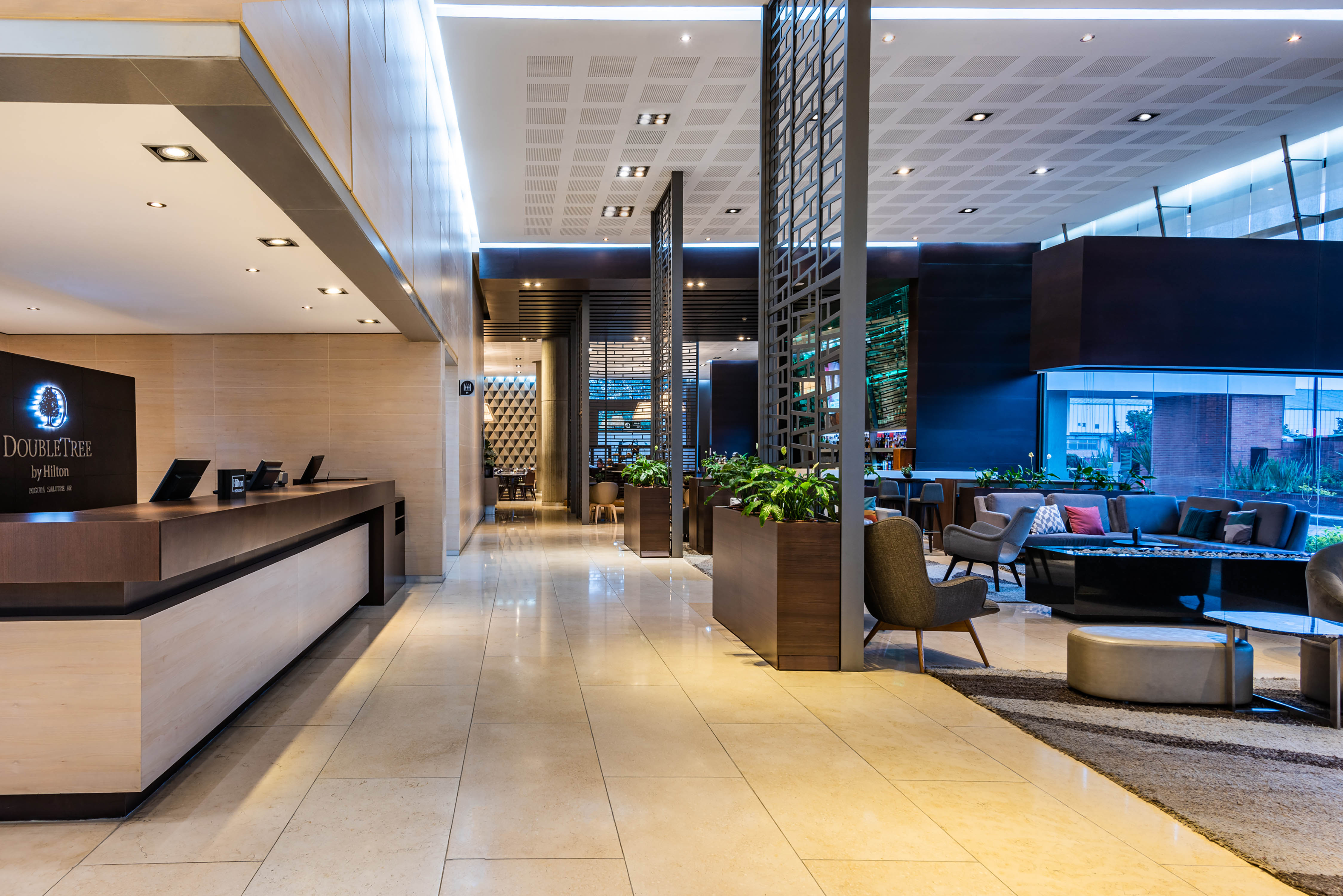 Hotel Lobby with front desk and seating area