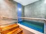 bath with stairs and walkway