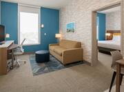 guest suite living area, bedroom, 1 king bed