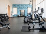 on-site fitness center, treadmills, ellipticals, free weights