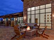 exterior patio with fire pit and seating
