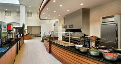 Complimentary Breakfast Area with Food Selections