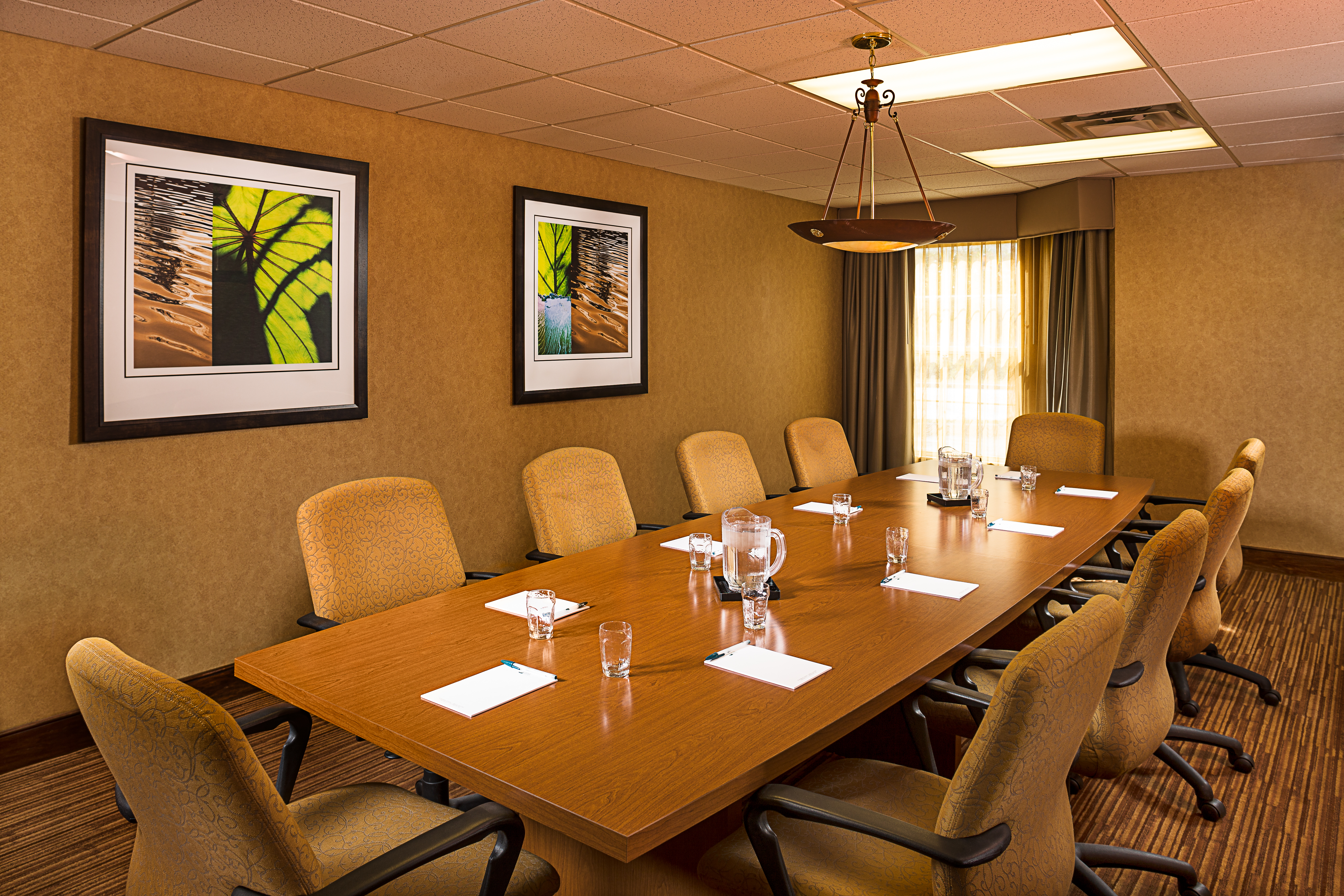 Meeting Space with boardroom table and chairs