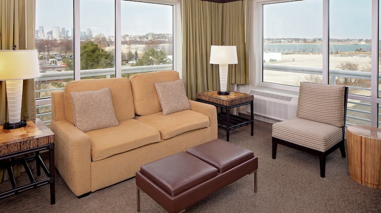 King Suite Living Space with Water and City Views