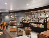 Table Seating, Display Items and Service Counter at Starbucks Café