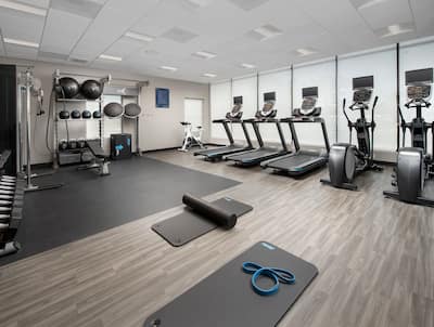Fitness Center with Treadmills Weights and Exercise Balls and Bikes