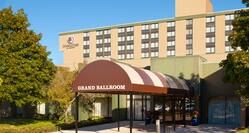 Daytime View of Awning of Entrance to Grand Ballroom, Landscaping, and Hotel Exterior in the Background