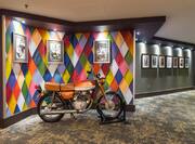 Motorcyle in lobby with artwork