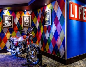 Motorbike in lobby, with colourful decoration