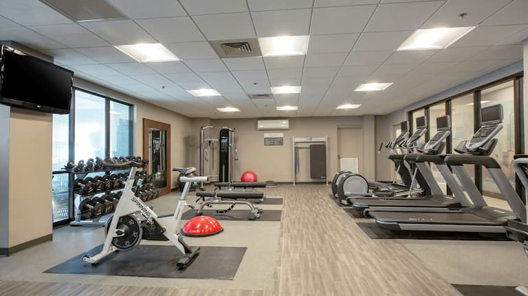 Fitness Center with cardio machines and TV