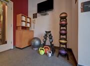 fitness center with weights and towels