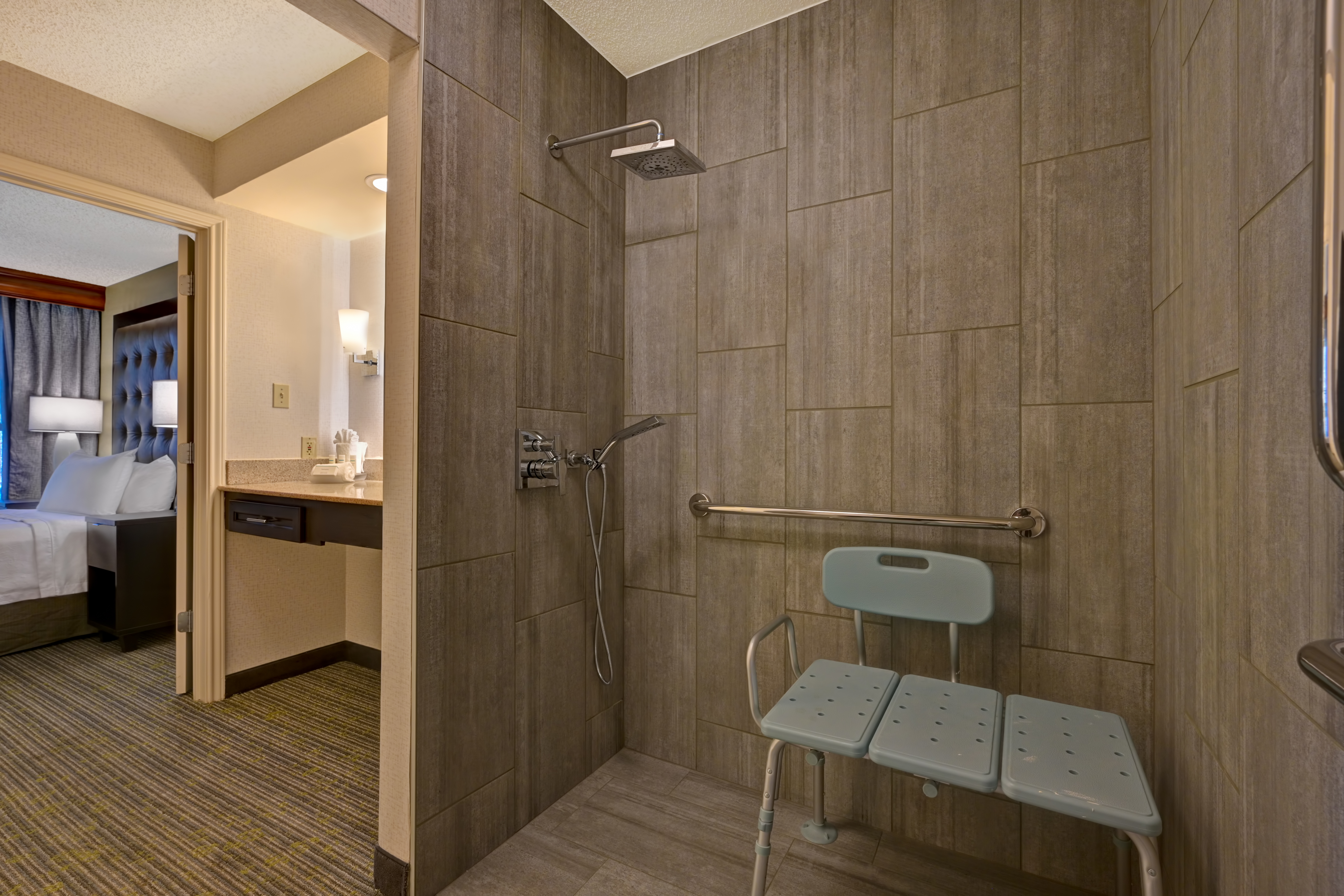 guest bathroom with roll in shower