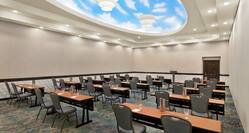 Spacious on-site meeting room featuring stunning detail with classroom style setup.