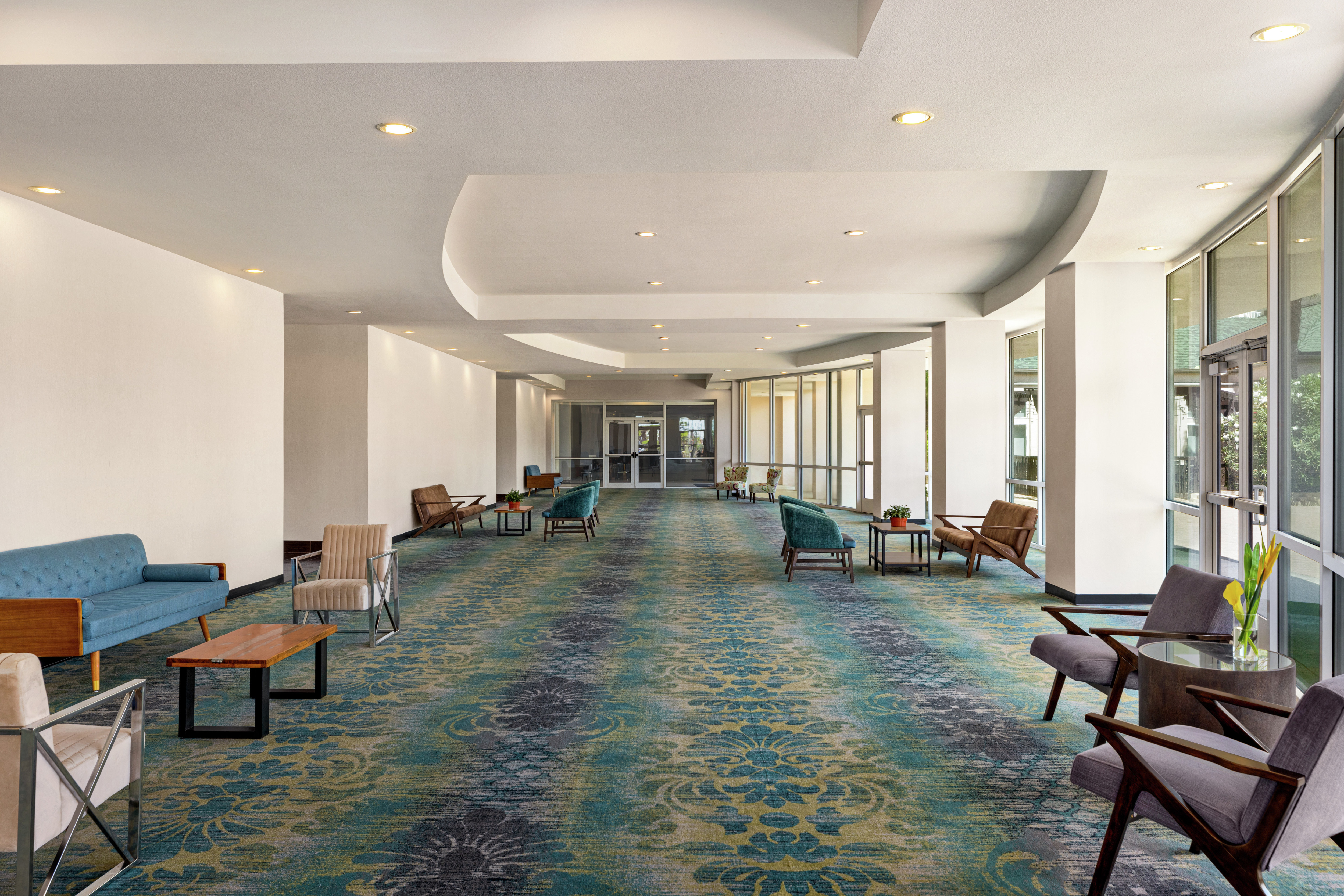 Spacious pre function spaces featuring beautiful natural light and stylish design.