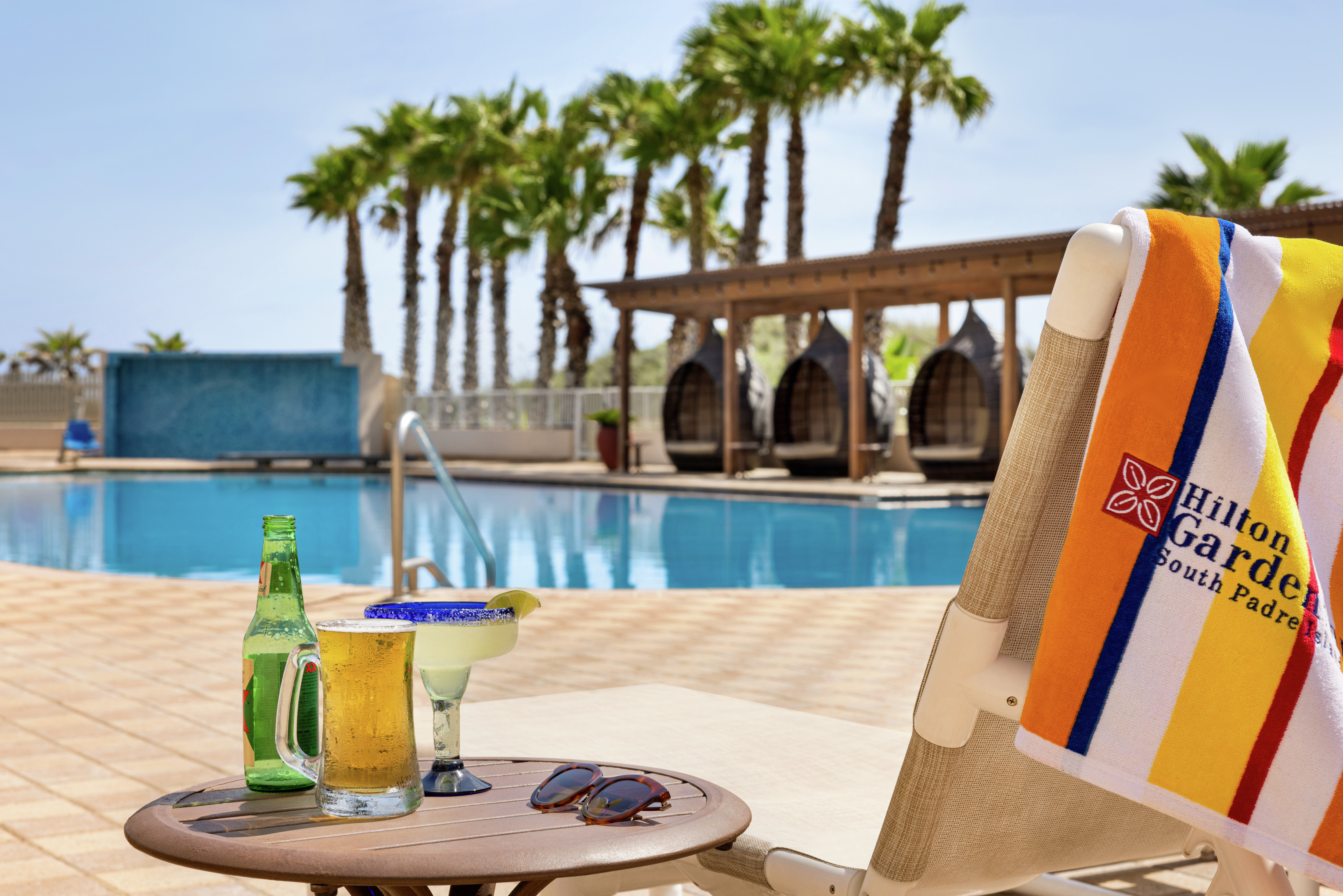 Relaxing poolside with delicious beverages from the bar.