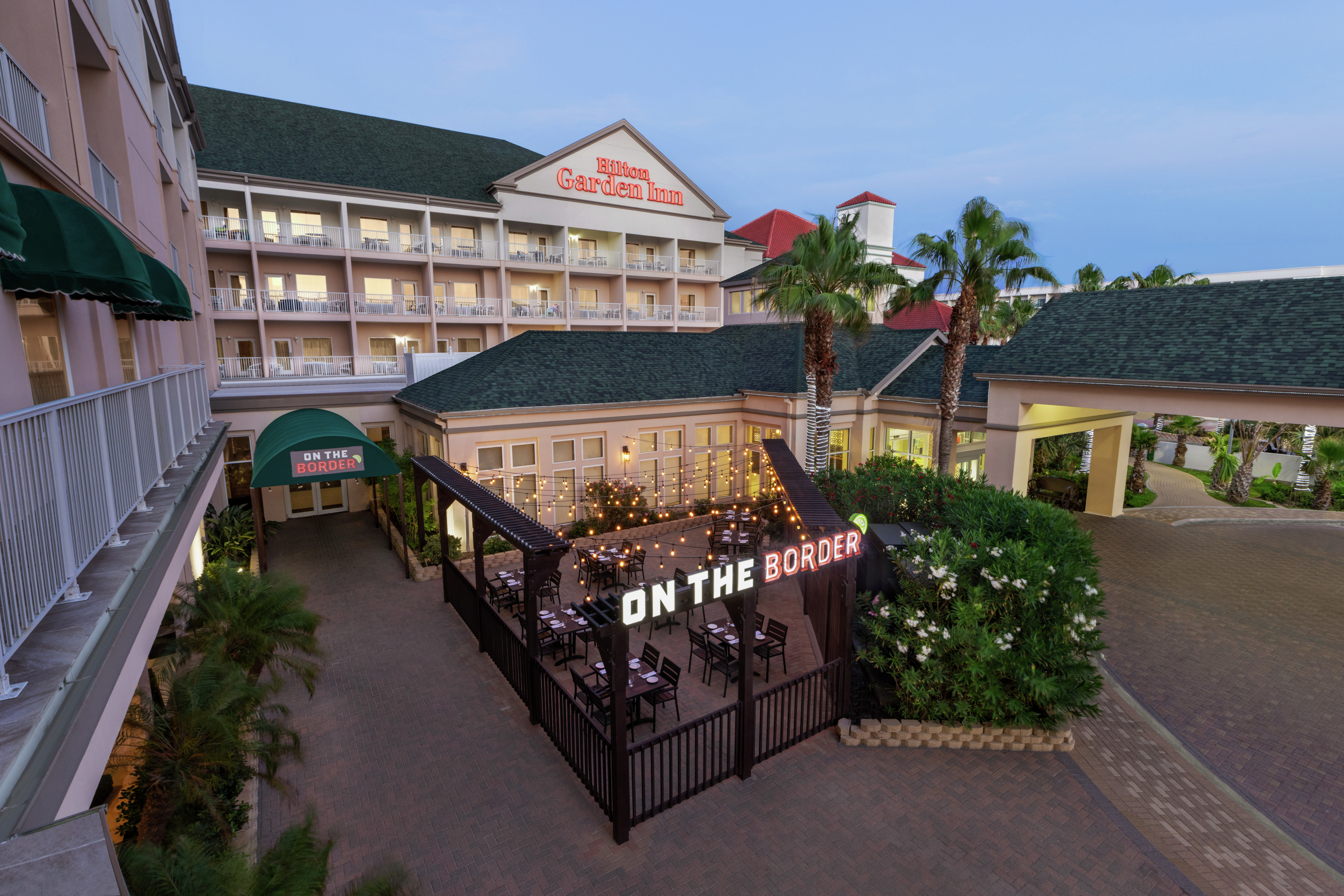 On-site restaurant with outdoor patio serving delicious food and beverages.