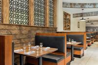 Delicious on-site restaurant with ample seating and inviting atmosphere.