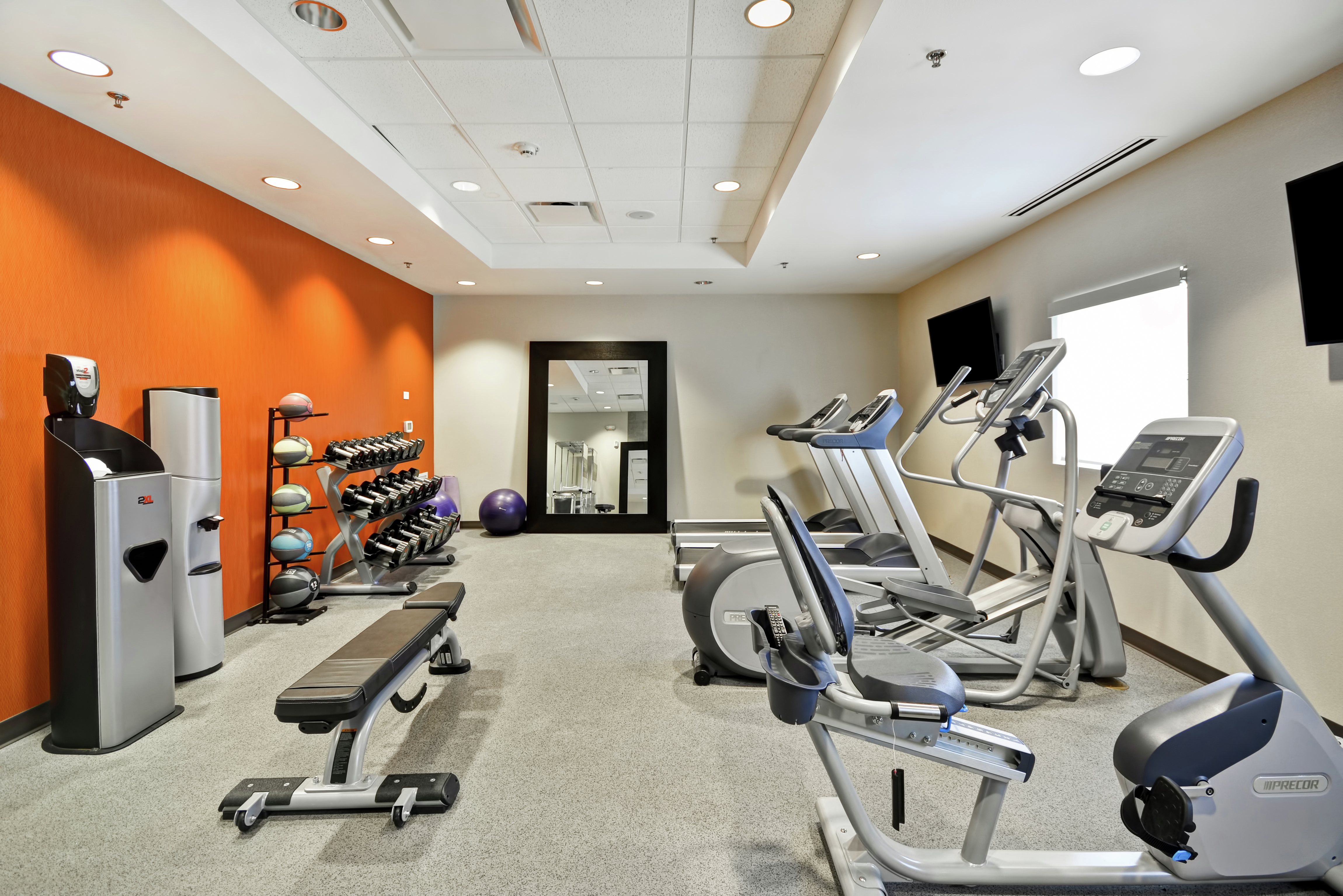Fitness Center with Treadmills Weights and Exercise Bikes