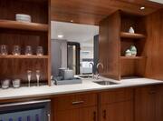Suite kitchen with sink, mirror and crockery