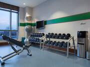 Fitness Center with Weights and Modern Equipment