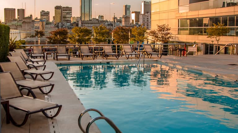 Outdoor Pool Area with City View