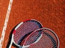 a Couple of Tennis Rackets on a Tennis Court