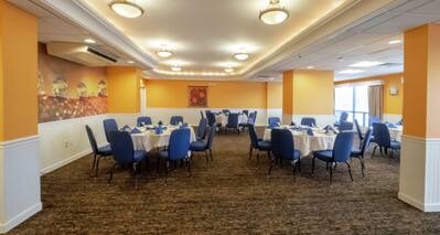 Banquet Room with Tables and Chairs