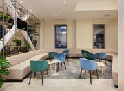 Lobby Seating Area with Armchairs, Tables and Sofa