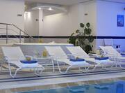 Health Club Indoor Pool and Loungers