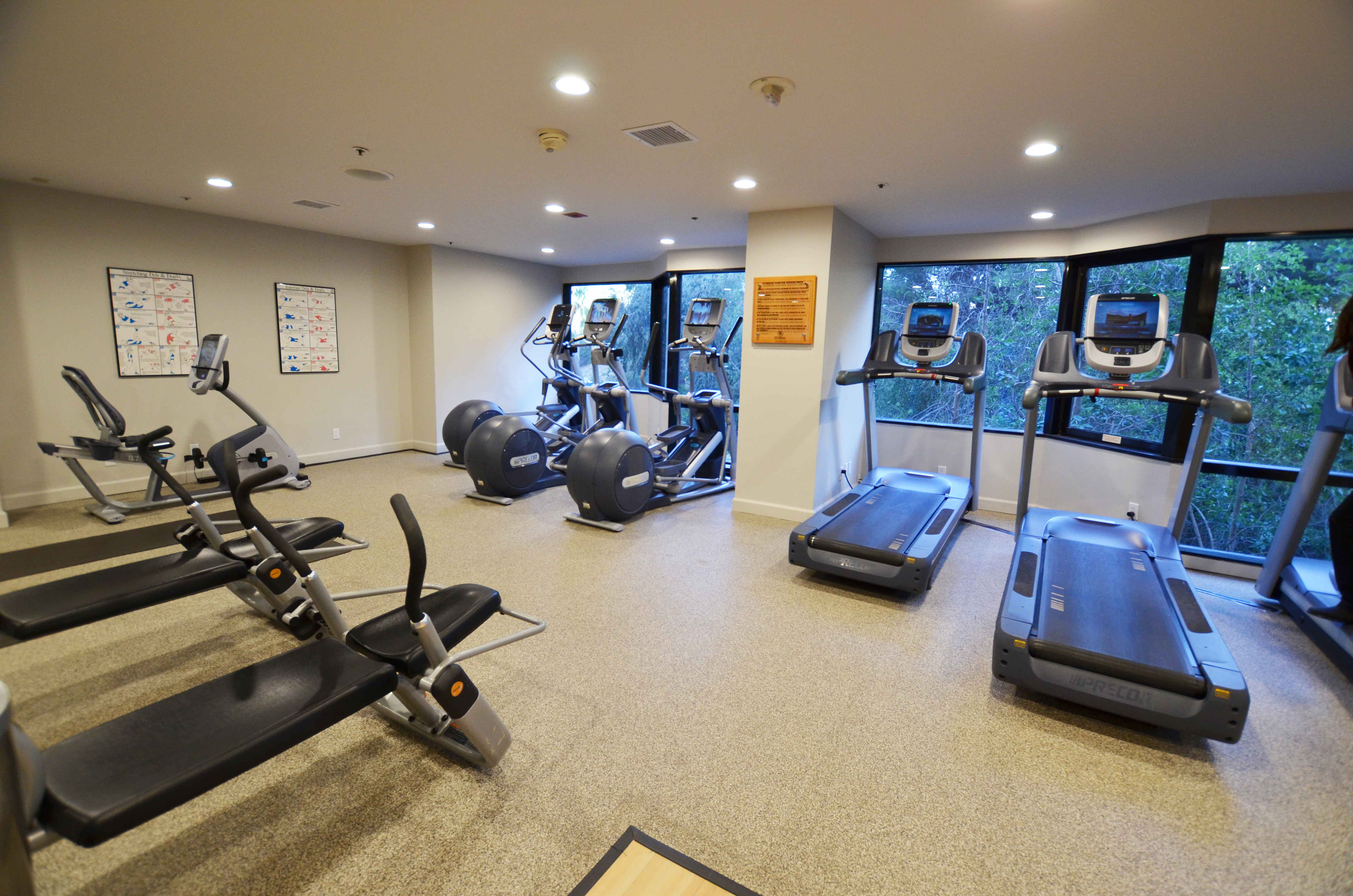 Fitness Center with Treadmills, Cross-trainers, Cycle Machine and Weight Benches