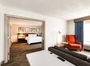 guest suite lounge area, bedroom entrance, 1 king bed