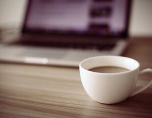 cup of coffee, laptop