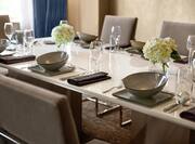 Close up of Presidential Suite dining Table with Place Settings