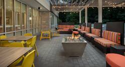 Outdoor Patio Area with Comfortable Seats around a Fire Pit