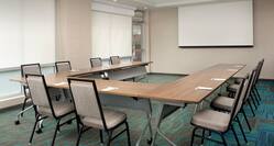 Meeting room with projection screen setup u style