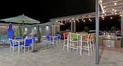 Patio with BBQ Grills at Night