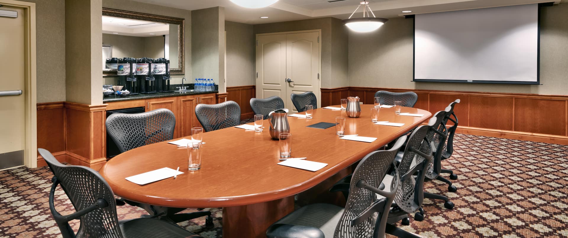 Boardroom with table and chairs